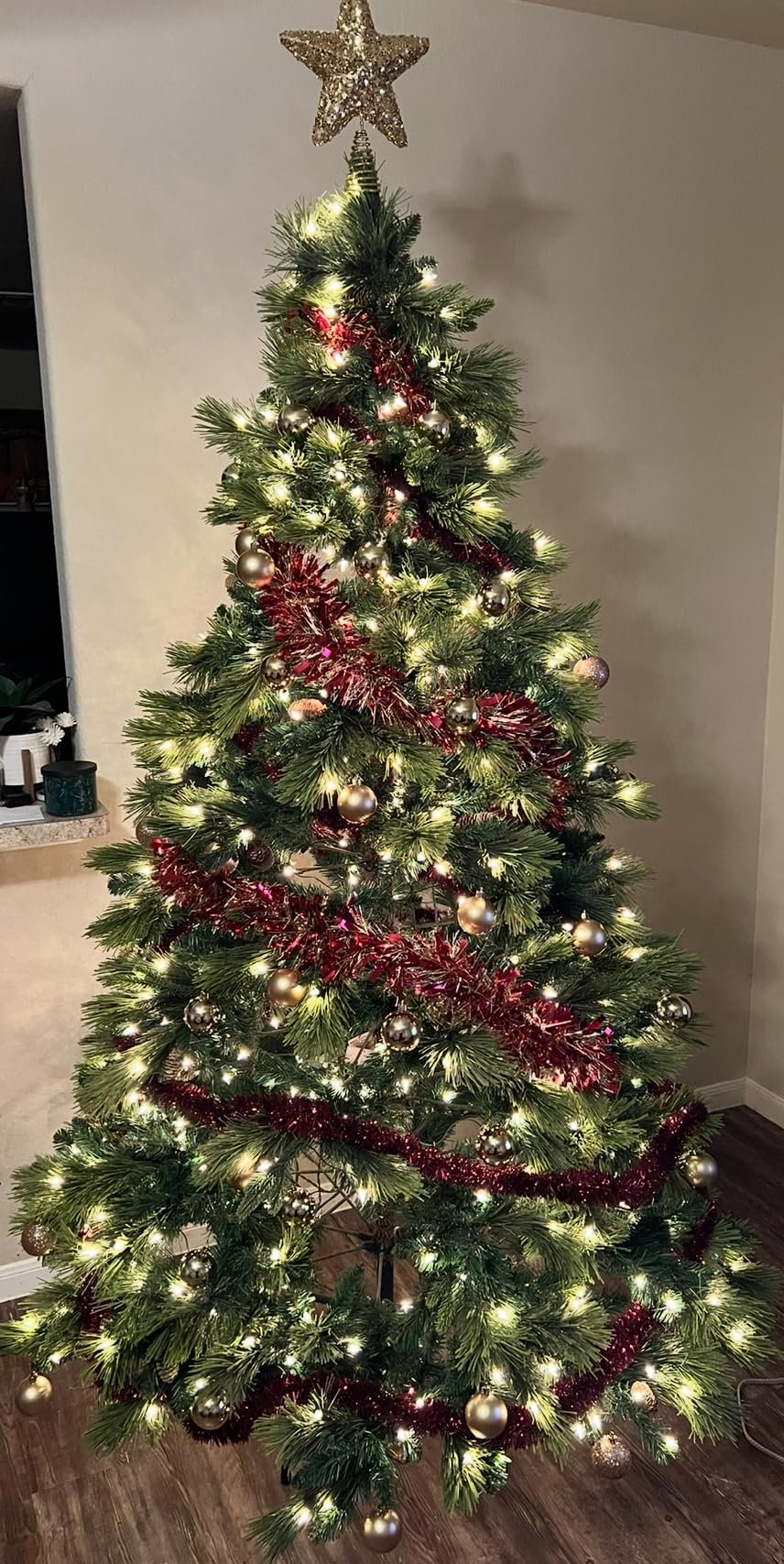 National Tree Company 7.5 ft Pre-Lit Carolina Pine Artificial Christmas Tree. 750 Clear Lights. 1.399 Tips. Includes Stand. Green photo review